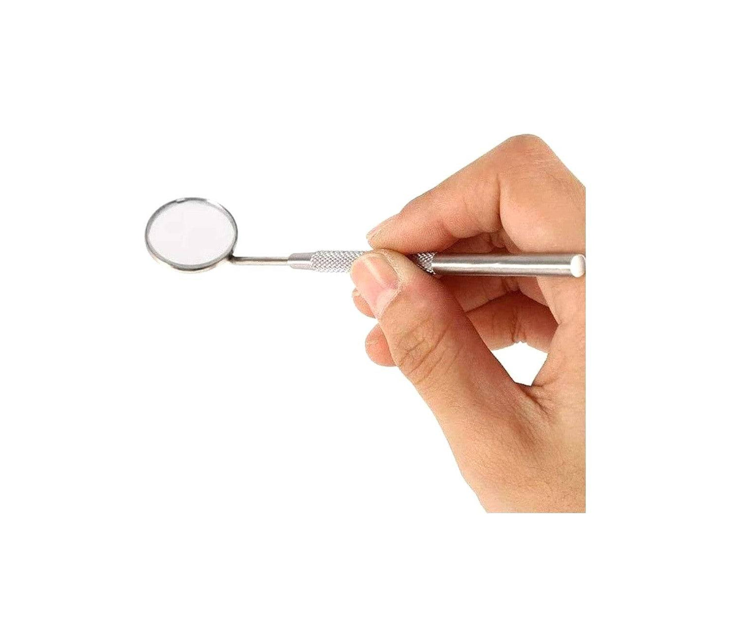 Hand holding stainless steel dental mirror